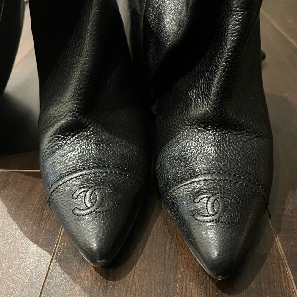 Authentic Chanel boots with dust bag. Worn 8 times. Has approximate 3 inch heel.